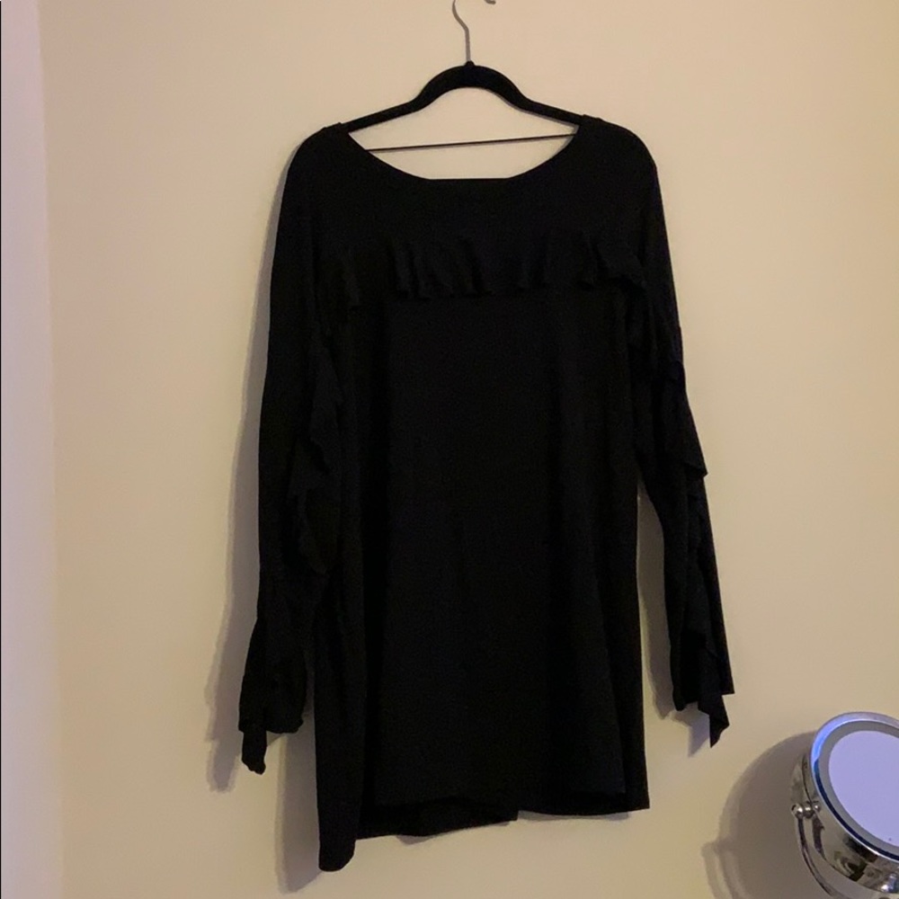 black ruffled shirt